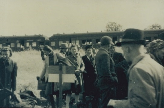 Archival photo of migrants arriving at the camp