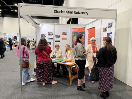 Charles Sturt University Staff providing information to perspective students at ALIA conference.