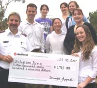 Captain Steve Dorman Sarah Pickthall (holding cheque) with CSU&rsquo;s manager of student services Paul Shaw and the ‘O Week&rsquo; team