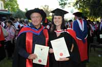 Local artist Dr Denis O&rsquo;Connor with this daughter Ms Sophie O&rsquo;Connor at their CSU graduation on Monday 12 December 2011. 