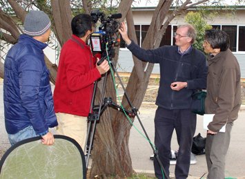 Photo of CSU academic Associate Professor Geoff Burrows (second from left) with NHK crew at CSU in Wagga Wagga. 