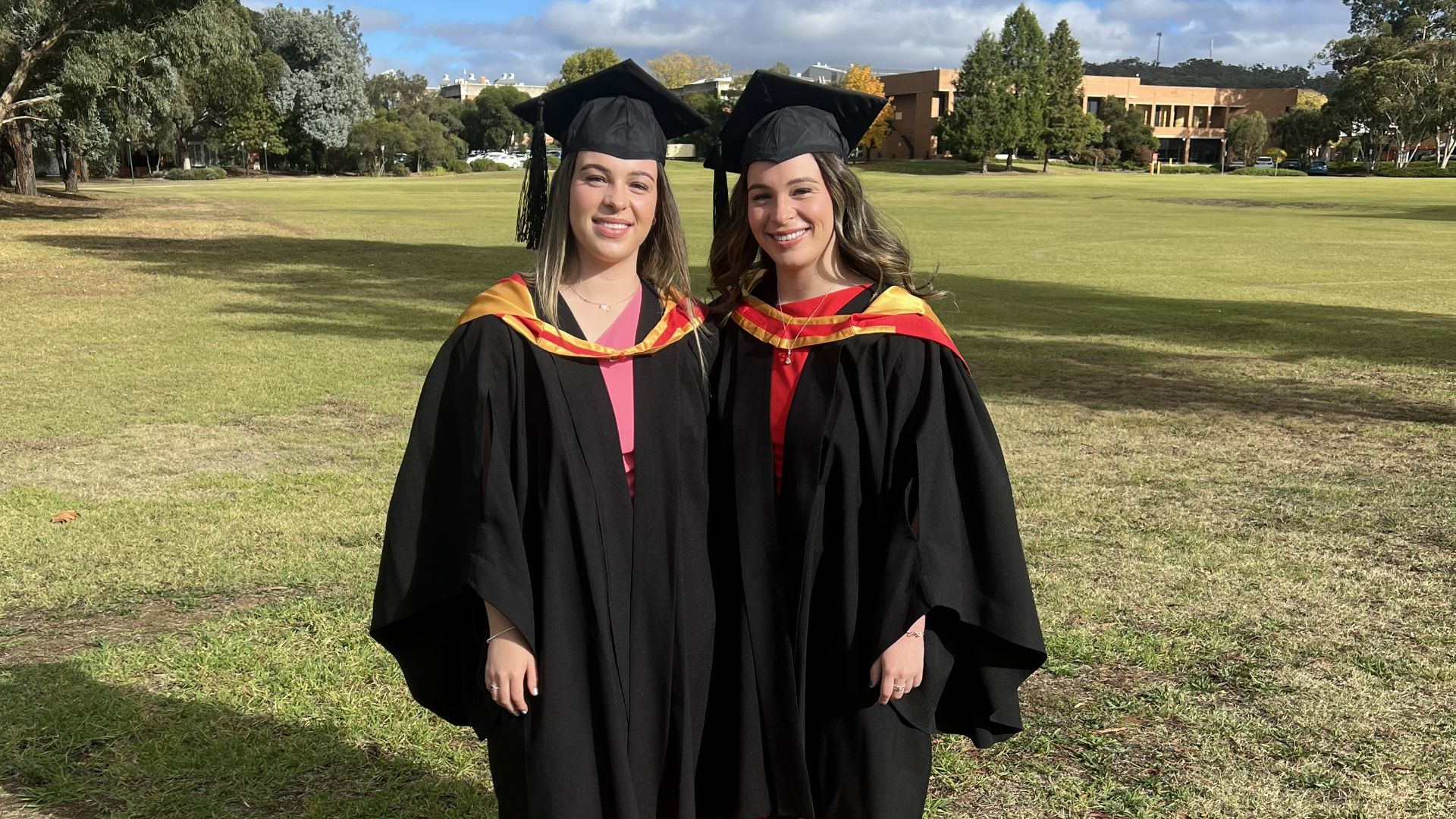Sibling bond sees Bathurst twins live, study and graduate together