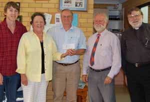 Board members welcoming the $500 000 cheque from the Vincent Fairfax Family Foundation are (from left) student representative, Mr Andrew Gillett, Ms Pat Stephenson, President Mr Bill Anscombe, Treasurer Mr James Hamilton and Anglican Archdeacon for the Riverina Diocese, Ed Byford.