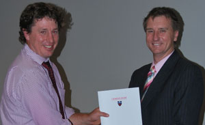 Dean of the CSU Faculty of Science, Professor Nick Klomp presents a certificate of appreciation to Mr Sandy McEachern, Director of Agricultural Consultancy, Holmes and Sackett, at the dinner for  the 'Partners in Agricultural Education' program.