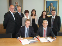 At front from left: Mr Heith Mackay-Cruise, CEO, SGA, and CSU Vice-Chancellor Professor Ian Goulter sign the agreement.