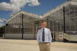 The new Head of the School of Agricultural and Wine Sciences Professor John Mawson outside the new glasshouses at CSU in Wagga Wagga.