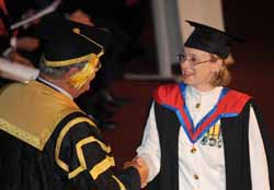 One of the graduates of the CSU-CIT Business Studies Pathway Program is Lieutenant Commander Samantha Woods was awarded a Bachelor of Business Studies with Distinction by CSU Chancellor Mr Lawrie Willett, AO at a graduation ceremony at CSU in Wagga Wagga in December 2011.