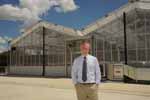 Head of the School of Agricultural and Wine Sciences at CSU in Wagga Wagga Professor John Mawson outside the new glasshouse complex to be opened in June 2012. 