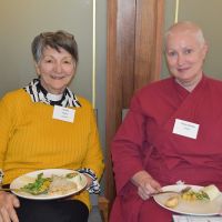 Chaplain Debbie Mazlin and Tempa Bejanke enjoy lunch. Photograph by Sarah Stitt