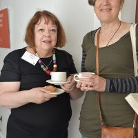 Two attendees enjoy morning tea at Old Parliament House. Photograph by Sarah Stitt