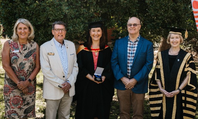 RAN Captain graduated with University Medal despite disruptions of service
