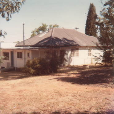 photograph of the building known as the Hut, Department of Library and Information Science, in July 1976.