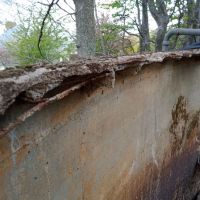 The edges of the collapsed roof, showing the degradation of the structure.
