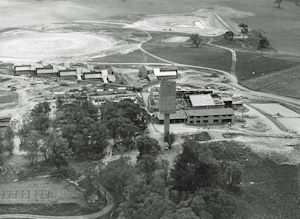 Old photo of Orange Agricultural College being built