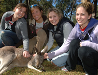 Mandy Greenspoon, Crystal Napasney, Laura Lande and Erin McAlister with Velvet the Red Kangaroo at Western Plains Zoo Dubbo. Photo: Belinda Soole.