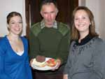 CSU students Ms Alana Hoskins and Ms Lara Williams with Mr Wes Warren at the free cooking clinic for Cootamundra men. Photo courtesy of The Cootamundra Herald.
