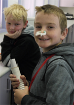 Tullamore&rsquo;s Sam Horsburgh (nosepeg) and Hayden Jones with exercise testing equipment at CSU.