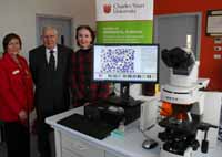 Head of the School of Biomedical Sciences at CSU Associate Professor Lyndall Angel with Bob and Diane Lazzarini and the new microscope. 