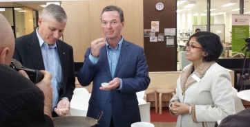Member for Riverina, the Hon. Michael McCormack MP, Education Minister the Hon Christopher Pyne MP and CSU student Mrs Soumi Paul Mukhopadhyay tasting chickpeas at CSU