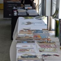 The stalls for Little Lost Bookshop and the ACC&C in the foyer. Photograph by Sarah Stitt 