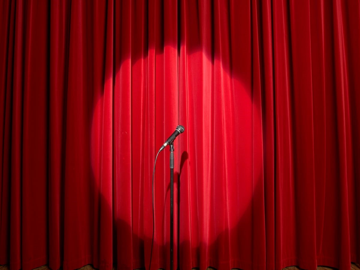 Red curtain with a microphone