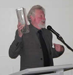 Professor John Carroll receiving his Drama Australia award for excellence in Drama Education at the Turning The Tides conference held in Sydney