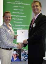 Veterinary science student Ms Stephanie Bullen from Colac in Victoria received the Moruya Veterinary Hospital Professional Experience Scholarship from the Dean of the Faculty of Science Professor Nick Klomp.