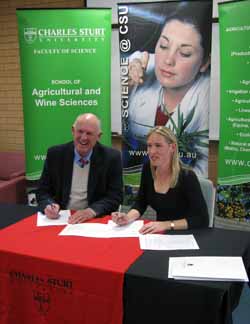 CSU's Dr Alison Southwell with Murrumbidgee CMA's Mr Greg Bugden at a MoU signing for the new student work placement program.