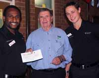 Regional Manager of Country Hope, Mr Chris Blake (centre) accepts cheque from CSU students Mr Bobby Porykali (left) and Mr Chris Hill.  