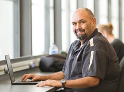 Mature student at computer