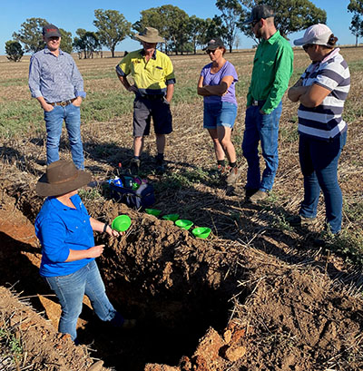 Dr Cassandra Schefe in the soil pit at a Riverine Plains Field Day (image courtesy of Riverine Plains)