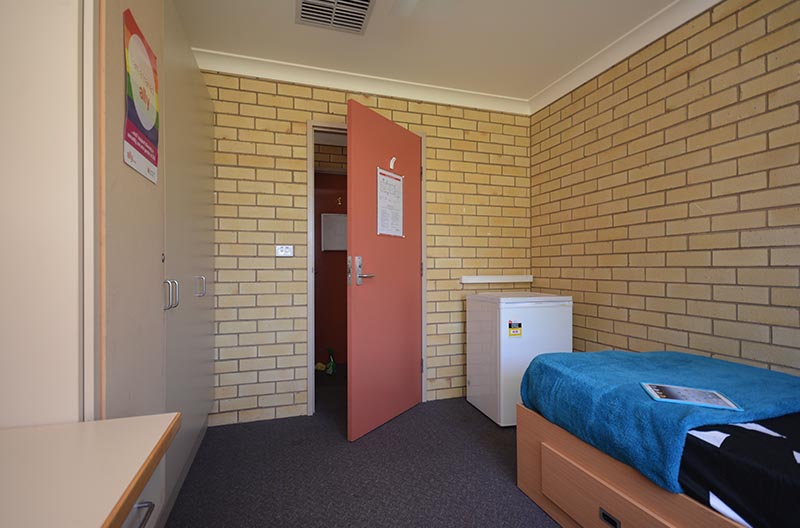 Sleeping area and wardrobe storage in a typical room
