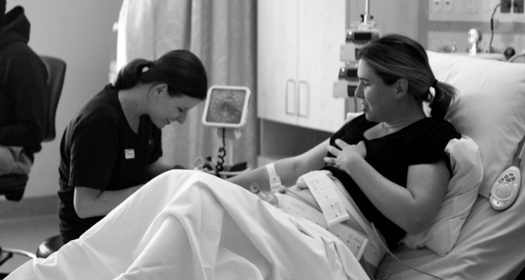 Torie Finnane working with patient