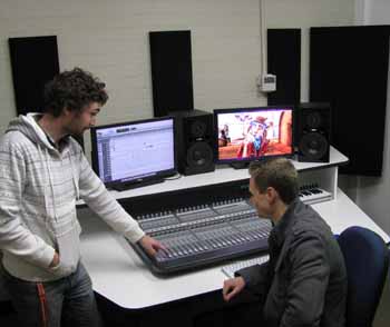 Third year animation and visual effects student Mr Rowan Karrer (seated) from Bathurst in the new studio with Technical Officer Mr Patrick McKenzie. 