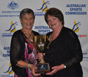 CSU&rsquo;s Ms Jean Ryan receives her AUS award from Ms Ann Mitchell.