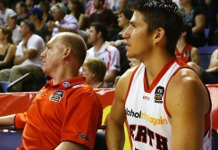 Dr Stephen Bird and Damian Martin of the Perth Wildcats during the semi-final win against the Wollongong Hawks.