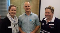 Mr Rohan Whitehead from Hume Medicare Local (centre) discusses collaborative health teams with CSU students Ms Georgia Whitehead (left) and Ms Laura Murname (right).
