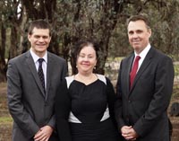 CSU VC Professor Andrew Vann (left) and La Trobe VC Professor John Dewar (right) with MDMS director Dr Kim Webber.
