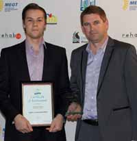 Apprentice chef at CSU, Mr Garrick Pahl (left) with Mr Tim Tisdell from BOC, a sponsor of the 2013 GTES Apprentice and Trainee Awards.