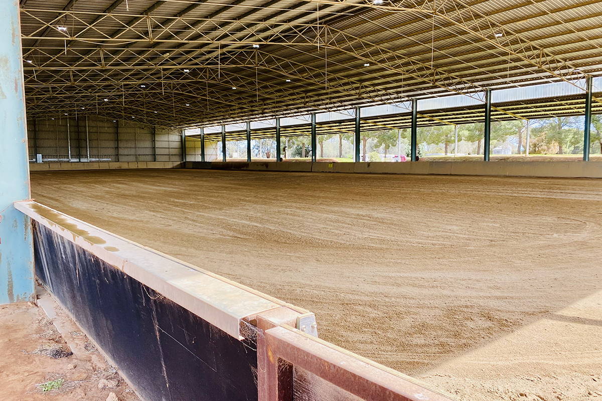 View of the indoor arena, graded and ready for use.