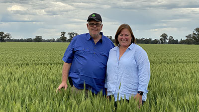 Craig and Fiona Marshall in a wheat paddock