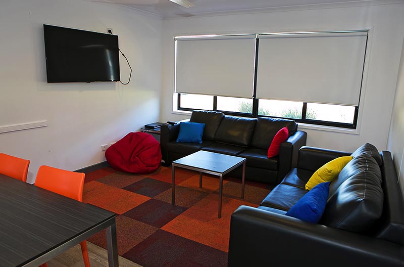 Lounge facilities with couch and tv