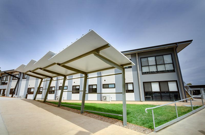 Covered Walkway with Hampden Village in the background