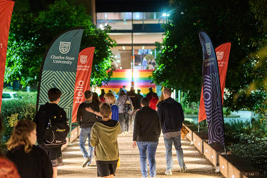 Participants making their way towards the rainbow staircase between activities