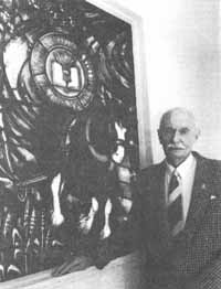 Don Joyes in 1994 with the Clydesdale window he donated to mark the dedication of Joyes Hall, CSU, Wagga Wagga. Photo courtesy of CSU Regional Archives.
