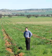 CSU acting Energy Manager Mr Chris O&rsquo;Connor in one of the native vegetation corridors extending 1.2 kilometres in length.  