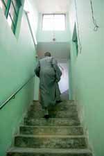 Image by Chiu Yin Tsang entitled Monk Ascending Stairs.