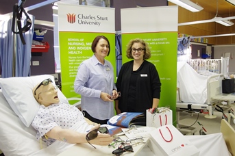 CSU nursing lecturer Ms Cathy Maginnis and OPSM Dubbo store manager Ms Lenore Pollard