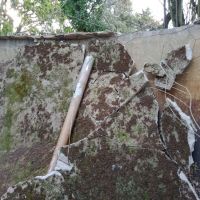 Inside the water tank, showing the extent of the collapsed roof.