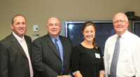 From left: Daryl Grant, Regional Manager Country Energy, CSU Deputy Vice-Chancellor (Administration) Professor David Battersby, CSU student Jodie Ivers and Craig Murray, Managing Director Country Energy.